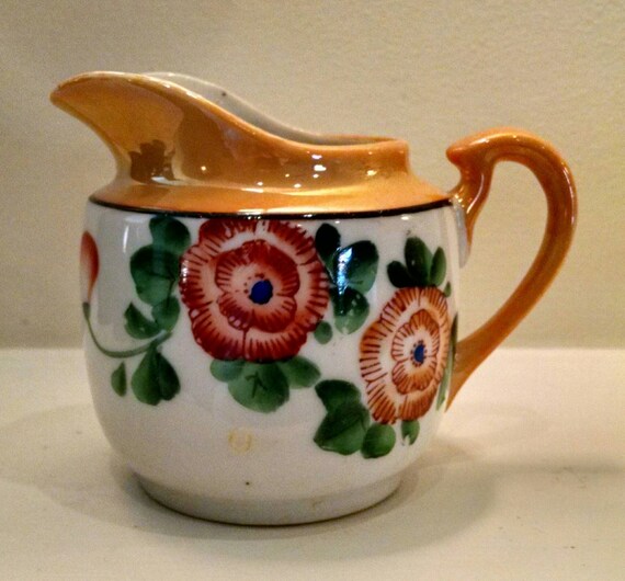 Lusterware antique/vintage porcelain creamer. Gold and white