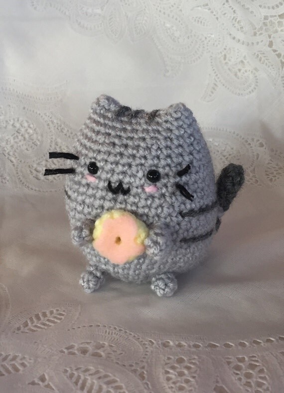 pusheen cat in a donut