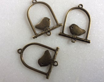 Antique bronze bird stand charm connector
