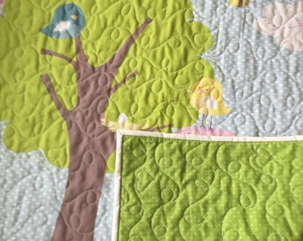 Beautiful quilt in elephant and turtle cotton fabric Machine quilted by me. An heirloom quality quilt for the baby/ toddler