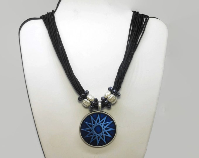 FREE SHIPPING Blue star pendant, round blue epoxy pewter pendant, faux translucent seed pearl ringlets, multi-strand black cord, star or sun