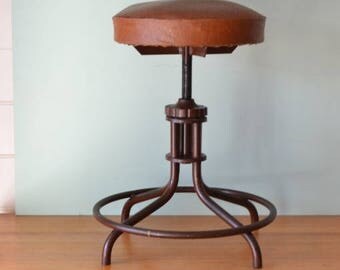 Vintage industrial adjustable swivel stool utilitarian