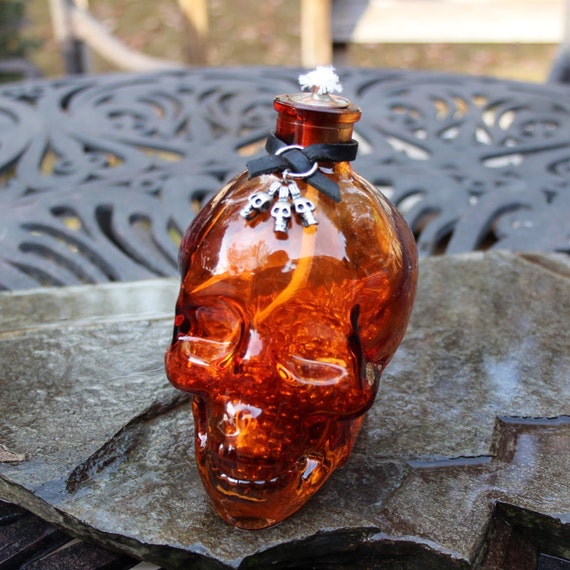 Crystal Skull Oil Lamp Tiki Torch by ShopPrettyPatina on Etsy