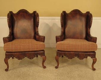 28971E: Pair CENTURY Upholstered Wing Back Leather Chairs