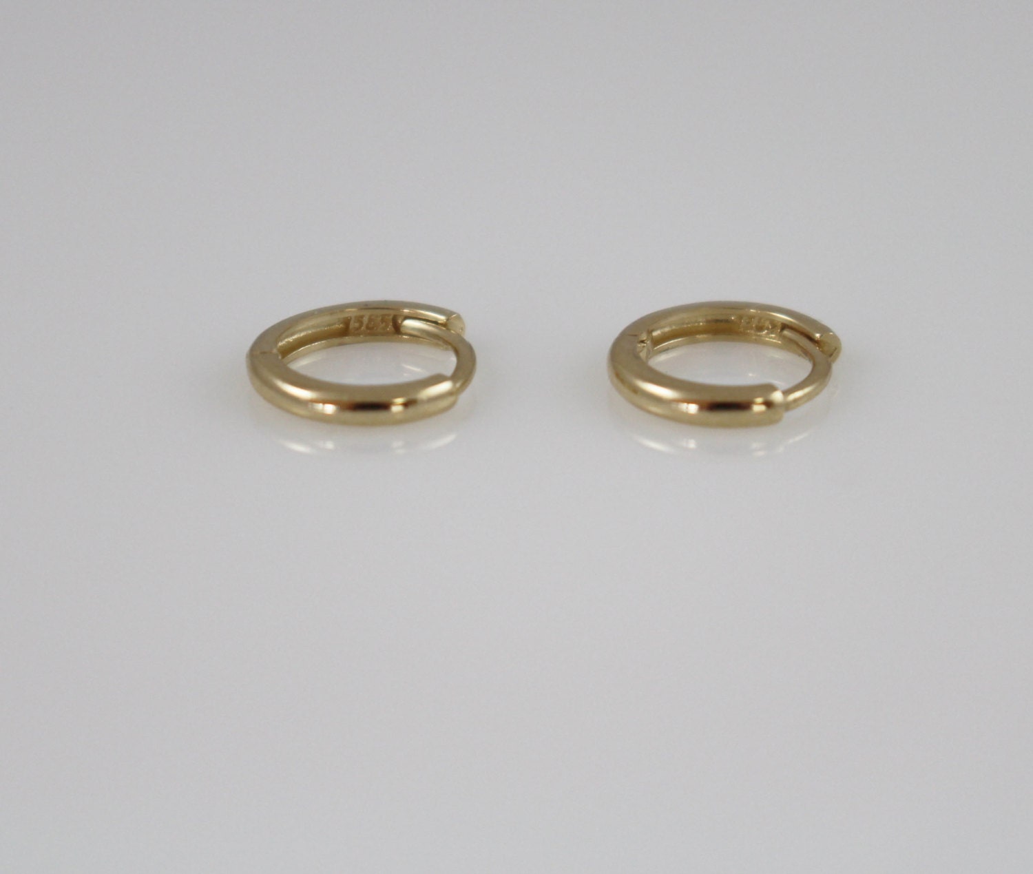 14k solid gold mini hoop Earrings 14k huggies hoop earrings