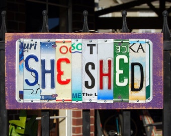 SHE SHED custom license plate signs