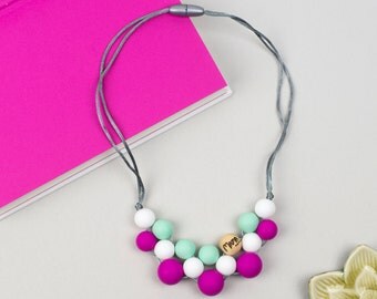 Silicone and maple teething necklace/ nursing necklace: Disco Doll (pink, white and mint)