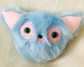 ugly stuffed cat