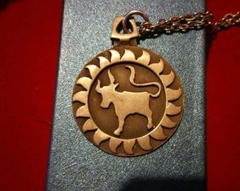 1970s horoscope Taurus ,bull in pewter pendent signed R.tennesmed from Sweden.