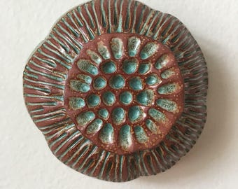 One Turquoise Green and Red Clay Flower Pod Wall Art