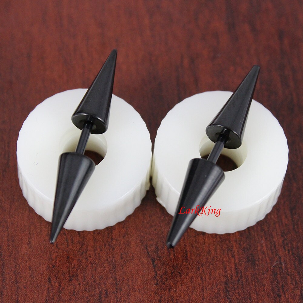 Double sided black spike stud earrings black spike studs