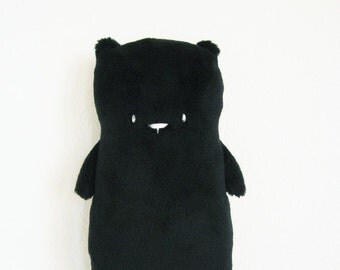 black stuffed teddy bear