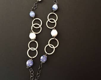 Chanel necklace with blue and white striped agate with gunmetal and silver chain.