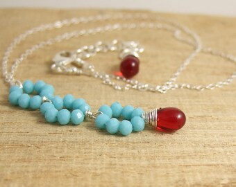 Necklace with Tiny, Turquoise Blue Crystal Rondelles and a Red Glass Teardrop Wire Wrapped with Sterling Silver Wire CDN-697