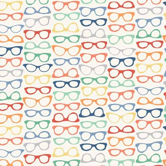 Sunglasses Travel Holiday Glasses on Cream Cotton Fabric from