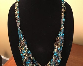 Trellis Ribbon croc. necklace/scarf/teal