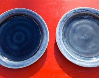 Two small Blue green Ceramic Plates Marked BT on the back Very Deep High Gloss Glaze