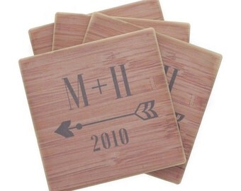 Set of 4 Stone Coasters with Aarow Design