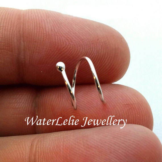 Silver double piercing earring. 18g. Two hole earring. Spiral