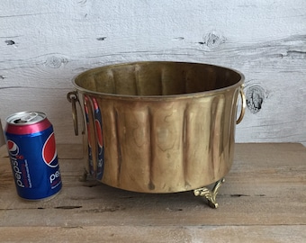 Brass planter with feet and handles. Large round brass planter.