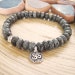 Om Bracelet - Larvikite Bracelet with Herkimer Diamond Quartz and Silver Om Charm, Norwegian Moonstone