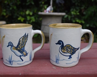Louisville Stoneware Co. Pair of Mugs Duck in Flight and Sitting Duck Featuring Cattails Made in Kentucky USA