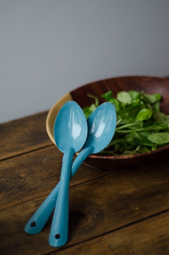 Blue enamel spoons. Serving