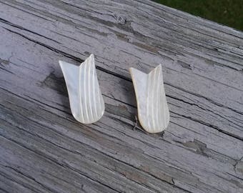 Vintage carved mother of pearl shoe clips