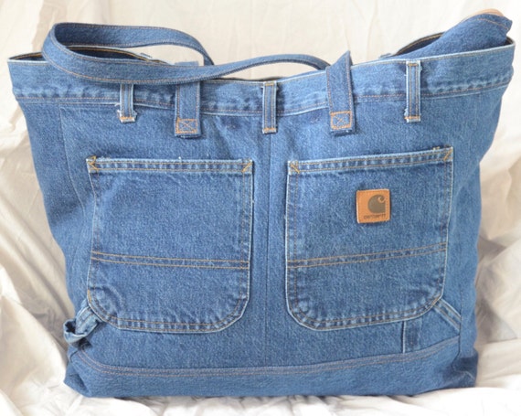 Items similar to Repurposed Denim Bag with multiple pockets on Etsy
