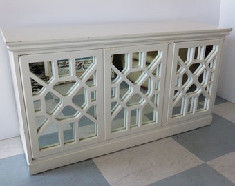 John Stuart Mid-Century Modern Chinese Chippendale Three Mirrored Door Fretwork Cabinet, One Drawer And Two Shelves. Grand Rapids, New York.