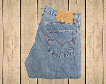 Vintage Levis 501 Jeans W34 L34 Canada Made Stonewash Blue Denim Straight Leg Button Fly Red Tab
