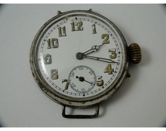 Rare over 100 years old first wrist watch huge size 40mm trench watch just serviced nice antique movement runs fine must see