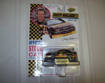 1992 Road Champs NASCAR #2 Pontiac Grand Prix RUSTY WALLACE Mobil Gas Sponsor 1 64 Scale Die Cast Unopened Mirrored Display Stand