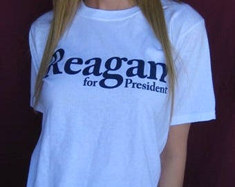 reagan riding velociraptor shirt