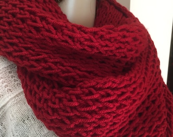 Lovely soft knitted burgundy infinity scarf, wraps around the neck loosely twice. Goes well with any outfit.
