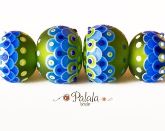 Set of blue and green matted lampwork beads