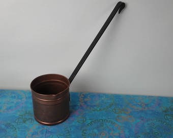 Vintage hammered copper dipper, ladle.