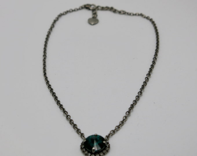 12mm emerald green genuine Swarovski crystal prong set halo of pave pendant necklace on a rolo chain with a lobster clasp