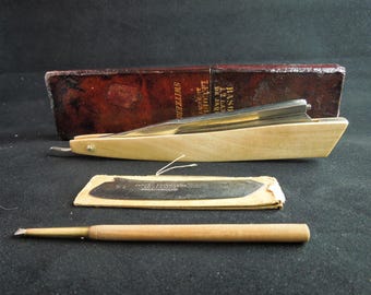 Jaques Lecoultre, Au Sentier, Switzerland Frameback Straight Razor With Two Blades, Matching Box, Tool and Certificate of Authenticity