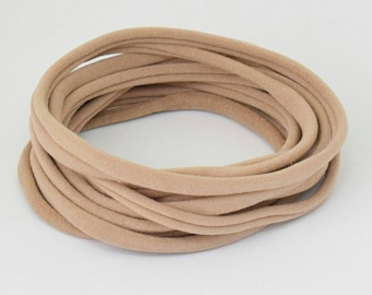 Super Light Nude Nylon Headbands (one size fits all) Packs of 10, 50 or 100