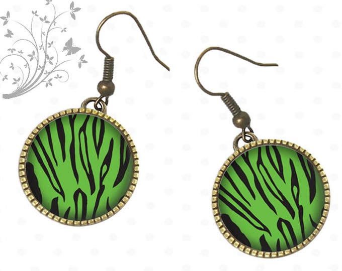 Zébré vert coloré sur bijoux d'oreilles, bijoux d'été.