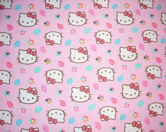 Hello Kitty on pink - Cotton Fabric - 14 1/2inches wide and sold by the yard