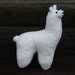 white stuffed llama