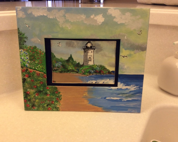 Lighthouse frame with easel back.