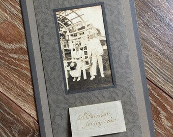 1923 photo calendar featuring a lovely older couple, Calendar is complete with all 12 months.