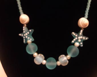 Summer fun - soft blue necklace with starfish and shells
