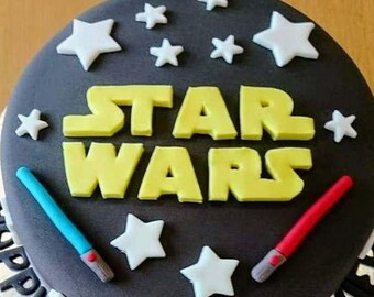 Star Wars fondant logo, 2 lightsabers, lots of stars, edible cake topper decorations