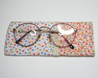 Blue/orange: Eyeglass or sunglasses case. Fully lined with soft fleece and trimmed with cotton lace.