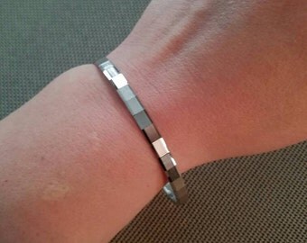 Vintage Monet L Bangle Bracelet Silver Tone Metal 1970s or 1980s Textured