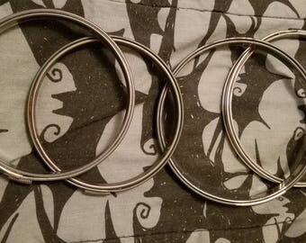 Four vintage metal embroidery hoops